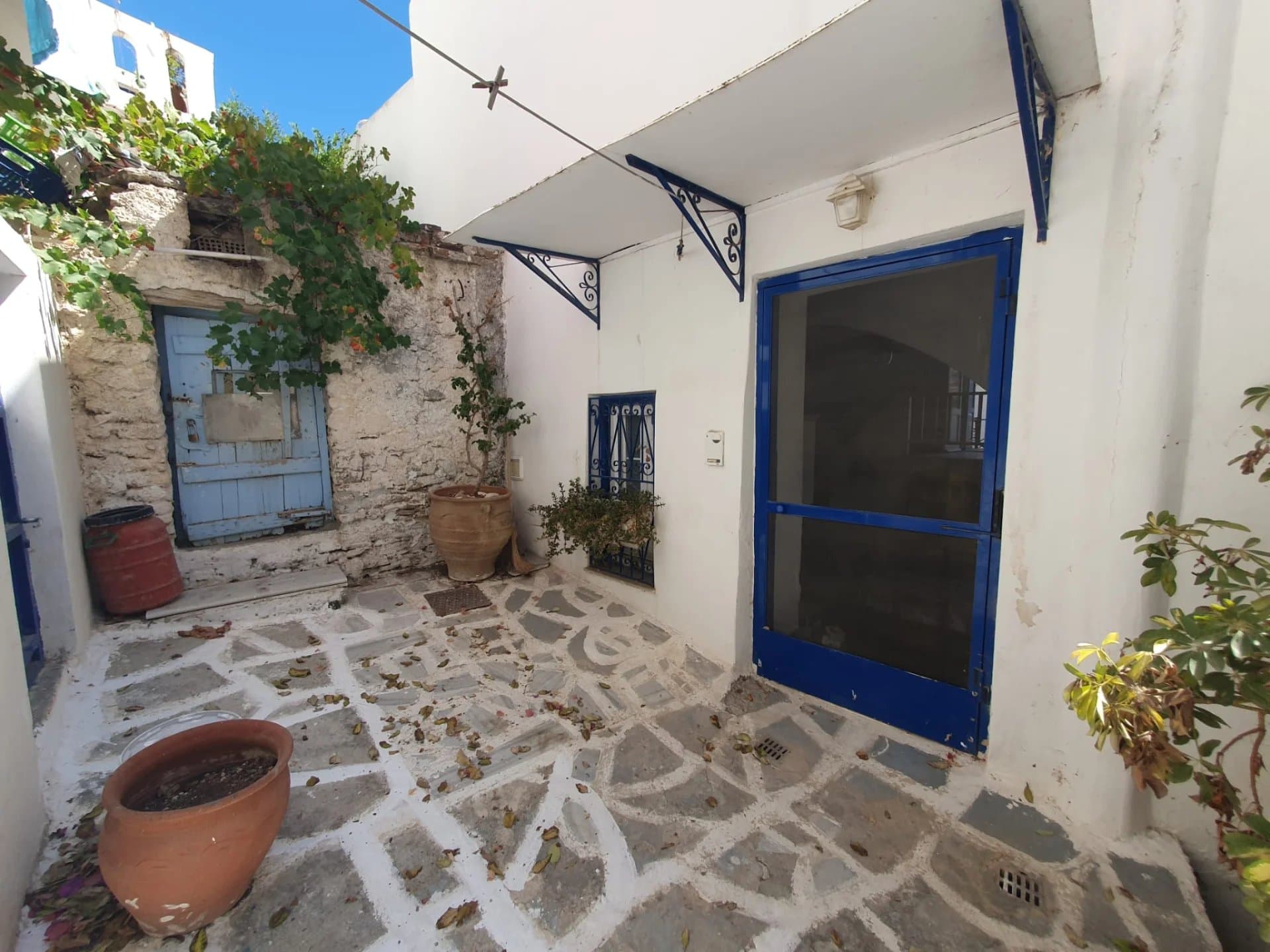 Traditional Village House for Sale in Lefkes, Paros – Historic Character, Terraces & Aegean Views - Image 2